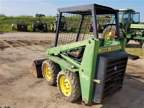 john deere 90 skid steer engine swap|skid steer lift height.